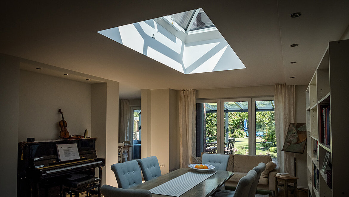 LAMILUX flat roof window above a dining table