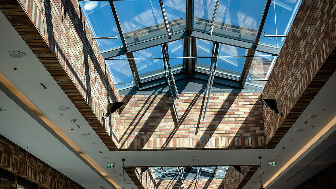 An open roof symbolizes historic building renovation.