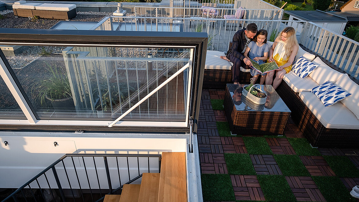 Roof terrace with a modernFlat Roof Access Hatch and seating area