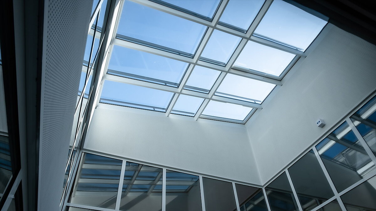 Glass roof structure of the Bertha-von-Suttner Realschule in Cologne, providing natural daylight illumination.