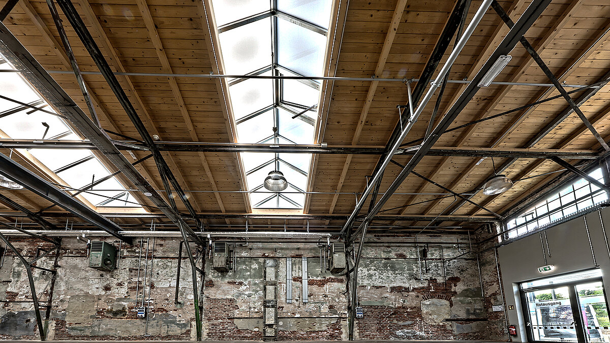 Chemnitz Tram Museum with Glass Roof PR60 in shed roof design, daylight entering the historic industrial hall through the roof glazing