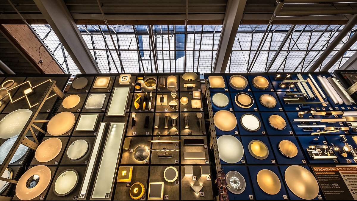 Lighting department in the OBI DIY store in Bamberg with various lamps and strip lighting on the ceiling.