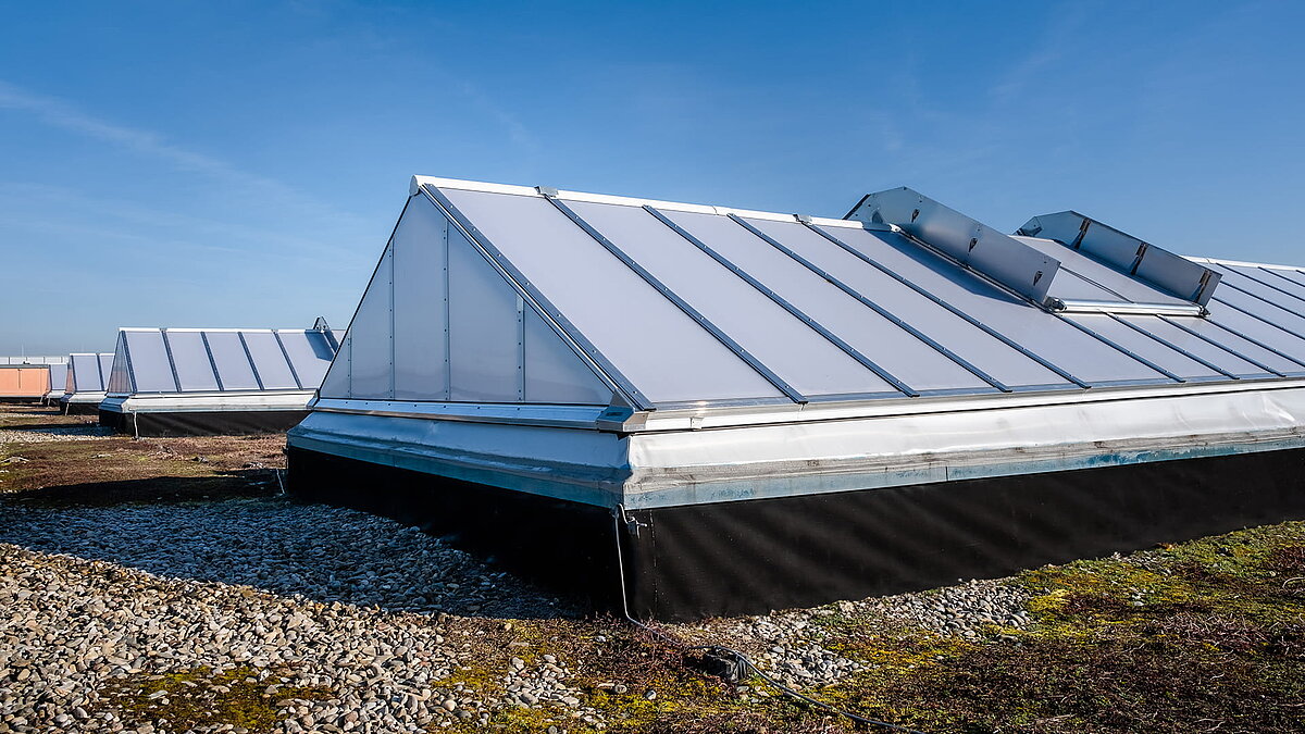 Skylights on the roof of the OBI hardware store in Bamberg, featuring transparent panels for natural lighting.