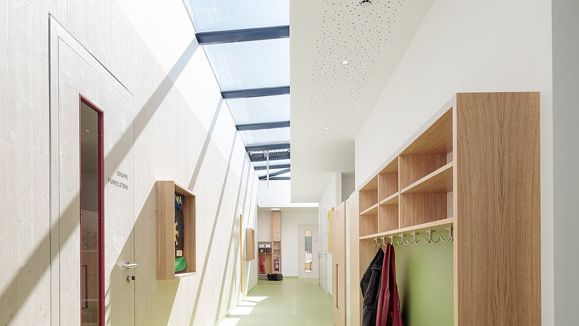 LAMILUX PR60 glass roof over a hallway with cloakroom