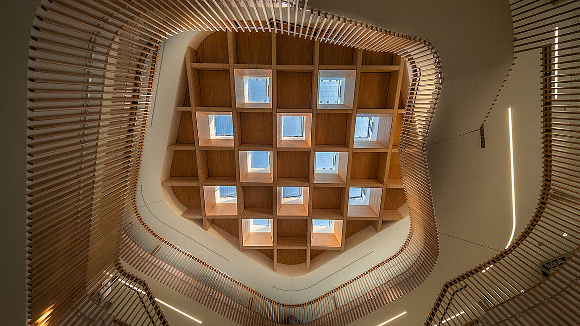 Upward view in the atrium of Grace Hopper Comprehensive School Teltow with LAMILUX Glass Skylight FE