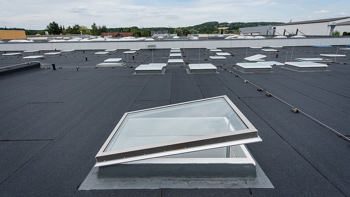 Roof of the Caritas building in Hagen with multiple skylights for natural light.