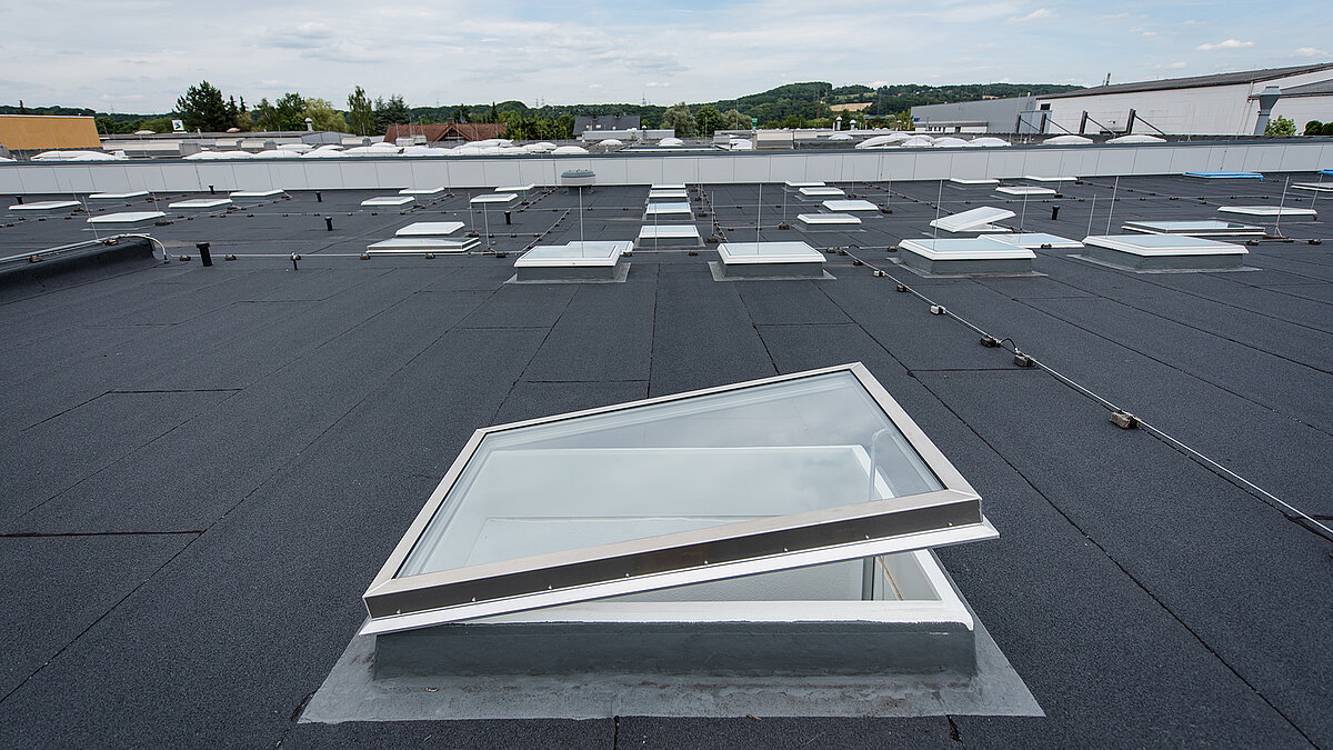 Roof of the Caritas building in Hagen with multiple skylights for natural light.