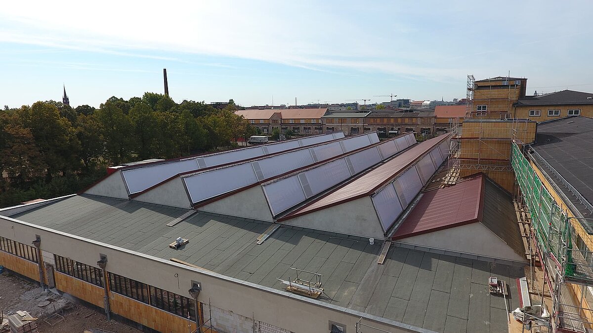 Exterior view of the old post station in Leipzig featuring new skylights.