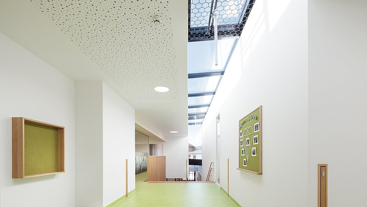 LAMILUX PR60 smoke lift glass roof with fall-through protection grille