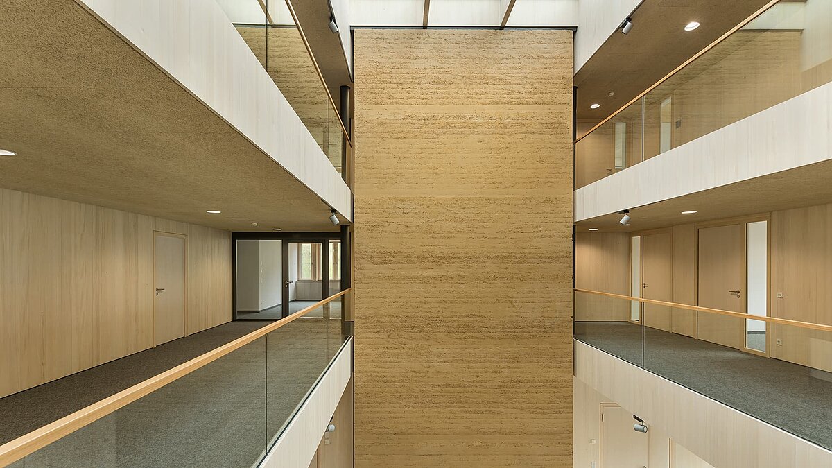 The LAMILUX PR60 passive house glass roof and FE glass elements provide natural lighting in the green centre of Immenstadt.
