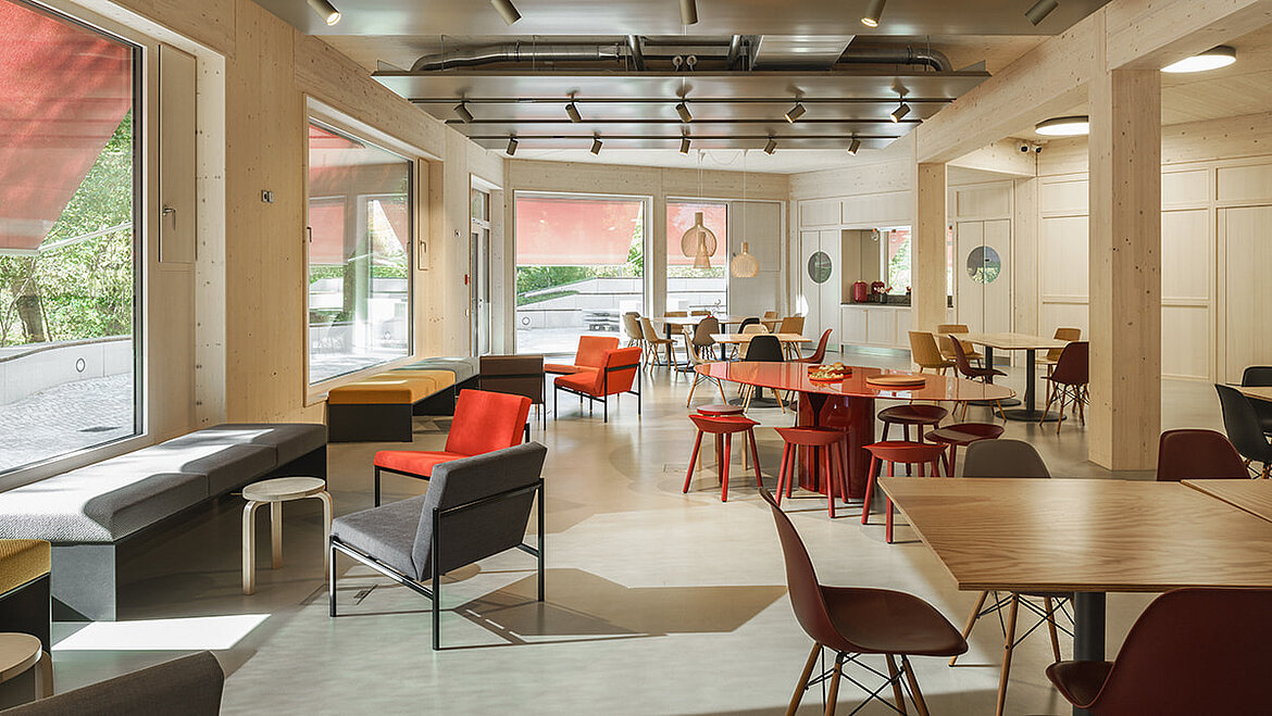 Bright dining room with plenty of natural light and modern furnishings