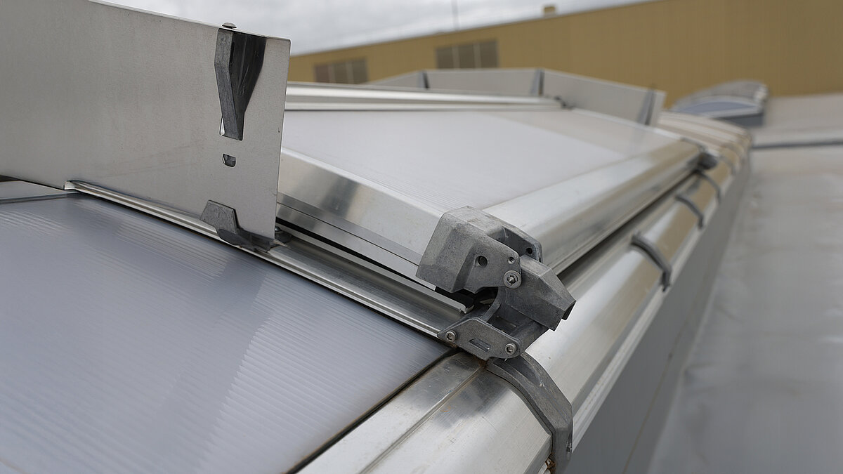 Close-up of strip lighting on the roof of the production hall at the Heidelberg printing press.
