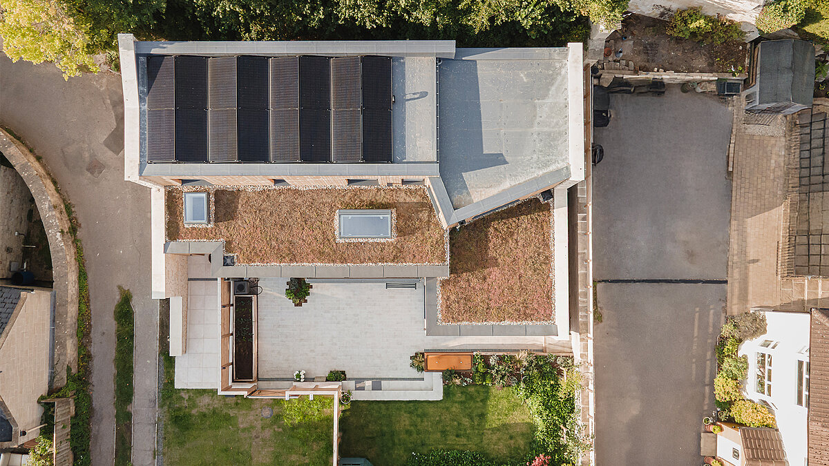 Top view of modern residential house with LAMILUX flat roof windows and courtyard