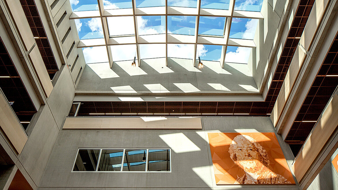 Atrium of the Willibald Gluck Grammar School with corridors leading off and large glass roof PR60