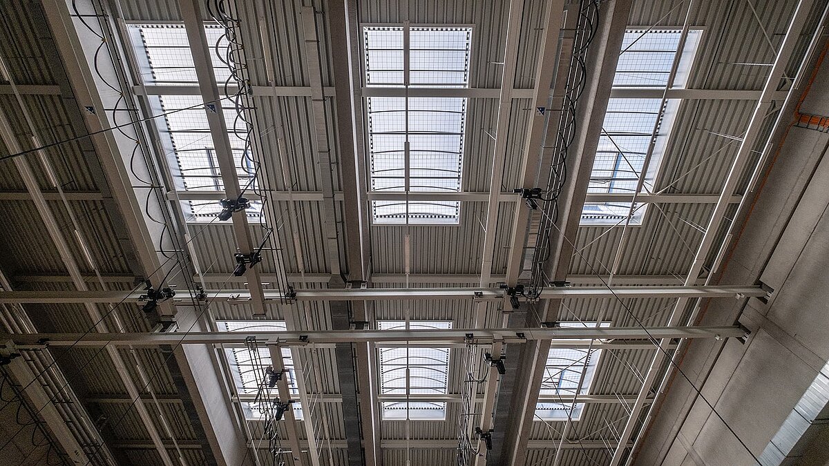 Ceiling of the Hamburg opera storage facility with LAMILUX B continuous rooflight for natural lighting.