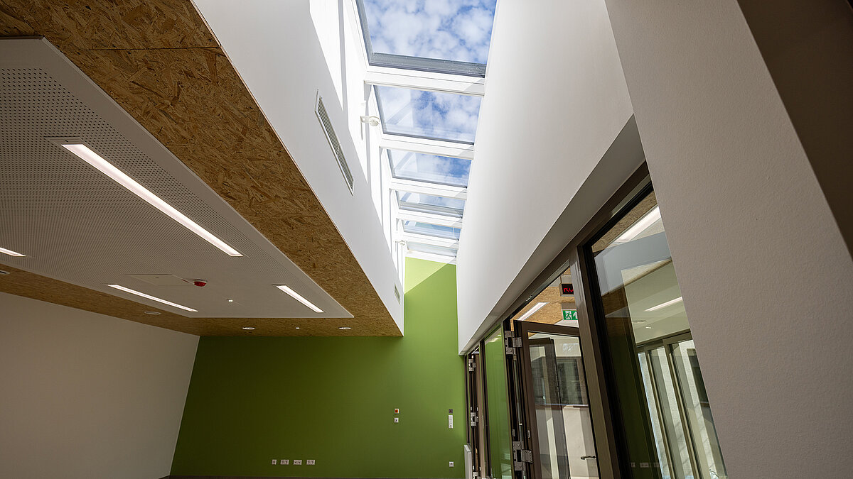 Psychiatry Emmendingen featuring LAMILUX glass roof in the corridor area for natural daylight illumination of the interior space