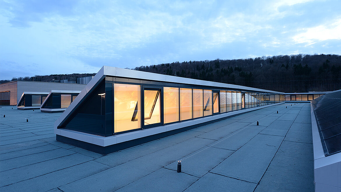 Shed roof with RWA sash at Erbe in Tübingen Shed roof with RWA sash | insights by LAMILUX