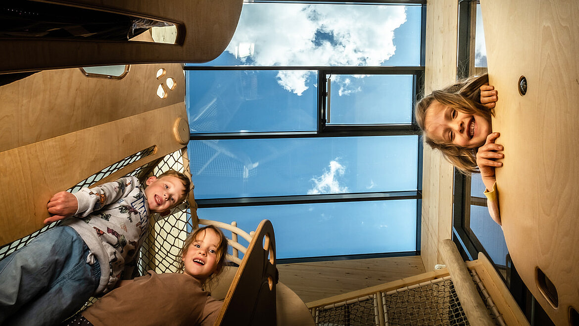 Children in front of a window background