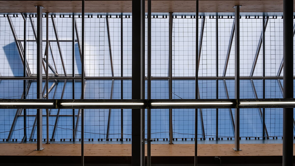 View of skylights on the ceiling of the OBI hardware store in Bamberg with grid construction and natural light streaming in.