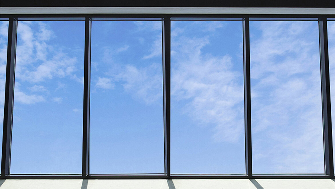 Glass roof with a view of the sky from below