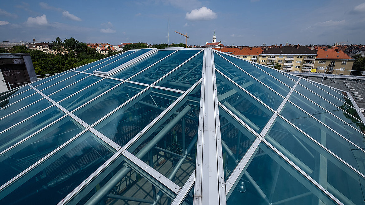 Bird's-eye view of the glass roof of Dante Gymnasium in Munich LAMILUX PR60 glass roof over the assembly hall of a high school | insights by LAMILUX