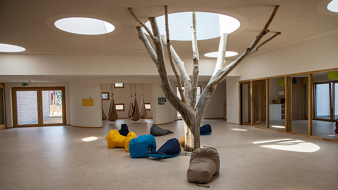 tree in the kindergarten tree inside the LamiKita | insights by LAMILUX