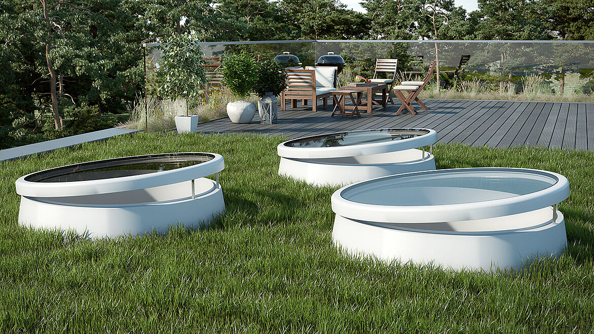 LAMILUX flat roof window F100 round on a roof terrace | insights by LAMILUX