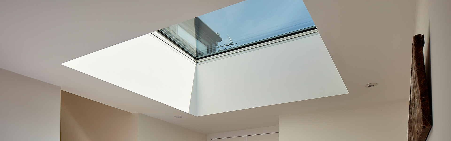 Natural light through large skylight in modern entrance area