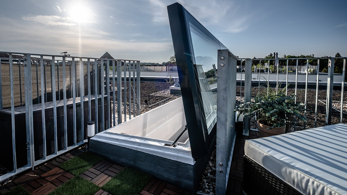 LAMILUX Flat Roof Access Hatch Comfort Swing at townhouse in berlin