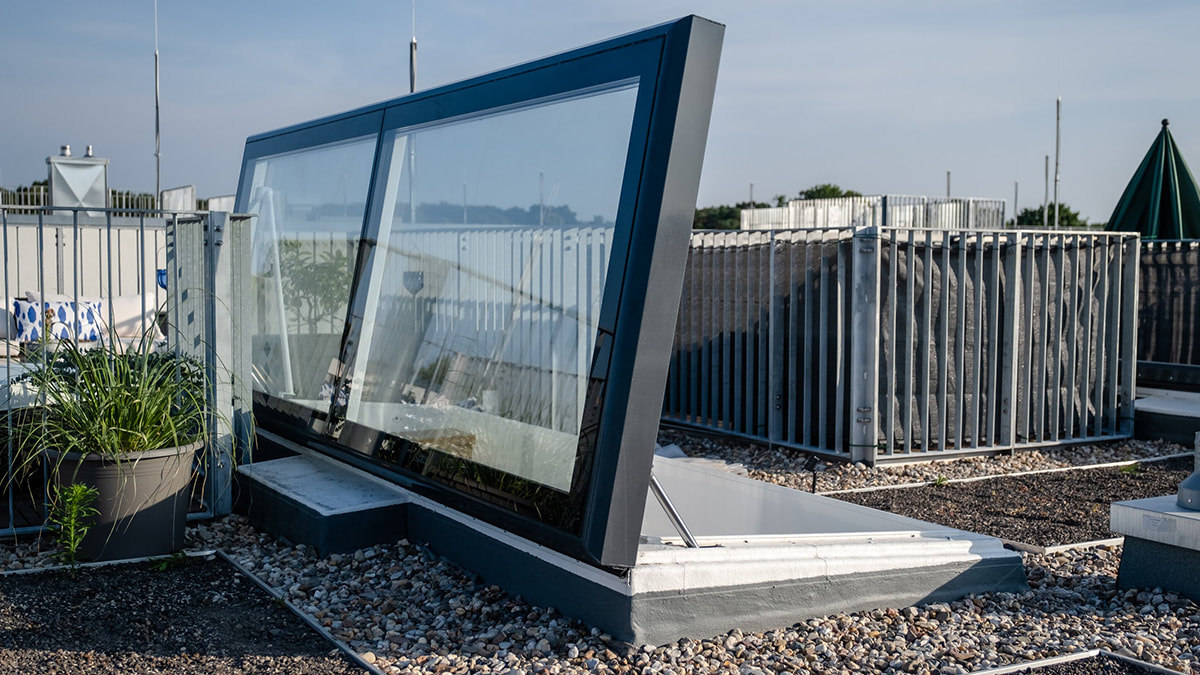 LAMILUX Flat Roof Access Hatch Comfort Swing at townhouse in berlin