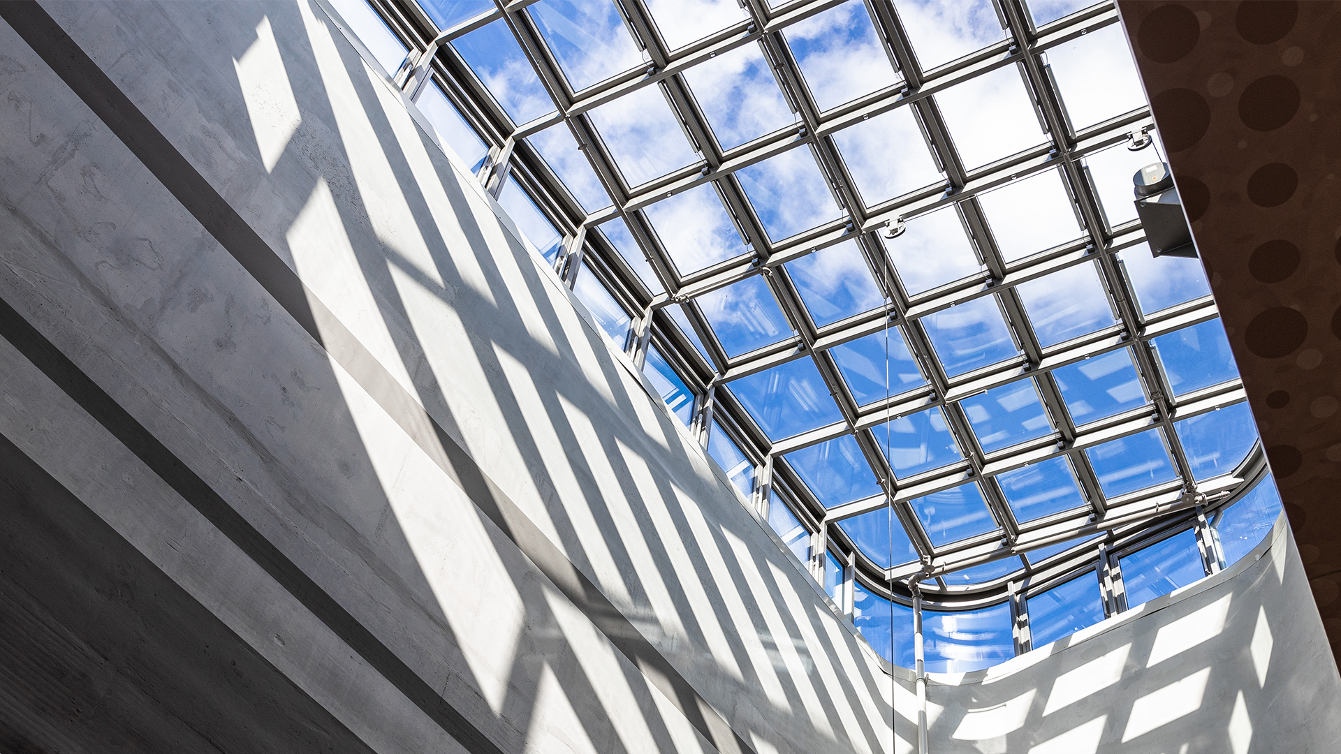 Cano shopping center Singen with modern glass roof in the atrium and incoming daylight