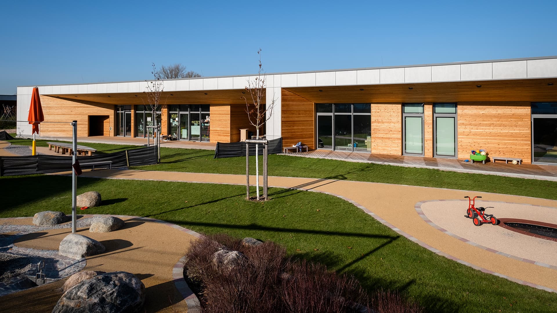Exterior view of the ‘World of Kids’ kindergarten with playground.